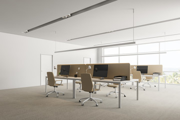 Panoramic office corner with beige tables