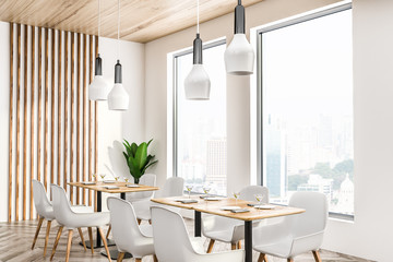 White cafe corner, tables