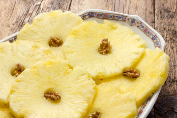 Fototapeta na wymiar Pineapple slices in a dish