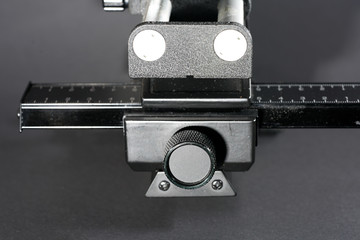 In macro photography and photomicrography, a bellows device is very helpful and almost indispensable