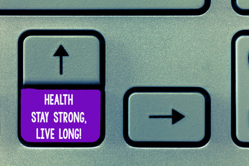 Text sign showing Health Stay Strong Live Long. Conceptual photo Have a healthy life selfcare prevention Keyboard key Intention to create computer message, pressing keypad idea