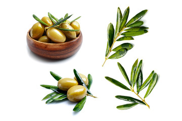 Green olives and leaves on white background