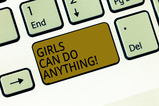 Writing note showing Girls Can Do Anything. Business photo showcasing Women power feminine empowerment leadership Keyboard Intention to create computer message keypad idea