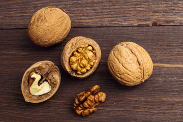Handful of Walnuts on wooden background