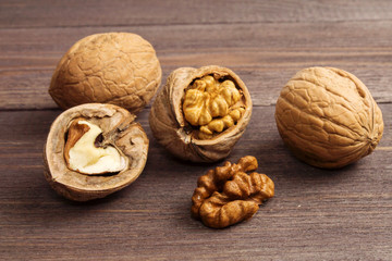Handful of Walnuts on wooden background