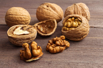 Handful of Walnuts on wooden background