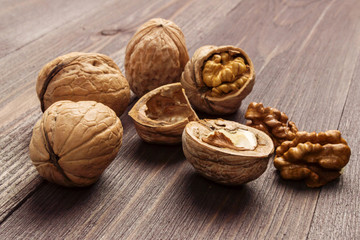 Handful of Walnuts on wooden background