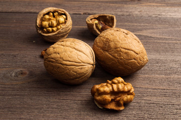 Handful of Walnuts on wooden background