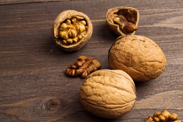 Handful of Walnuts on wooden background
