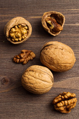 Handful of Walnuts on wooden background