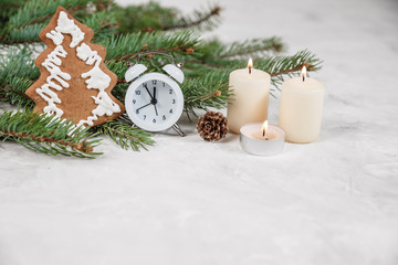 Christmas holiday background with vintage alarm-clock, Candy canes plastering background.