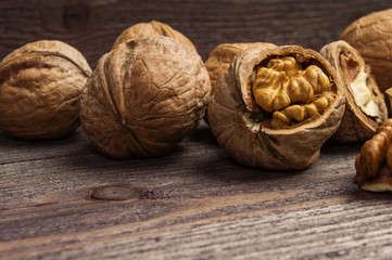 Handful of Walnuts on wooden background