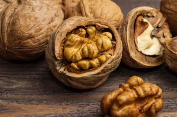 Handful of Walnuts on wooden background
