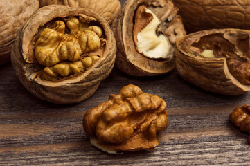 Handful of Walnuts on wooden background