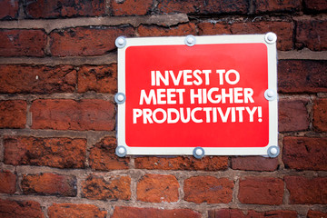 Fototapeta premium Handwriting text writing Invest To Meet Higher Productivity. Concept meaning Make investments for growing business