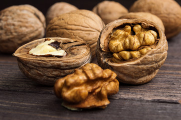 Handful of Walnuts on wooden background