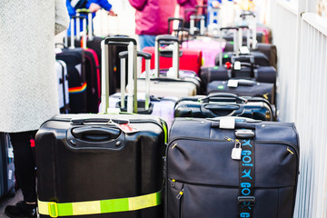 Luggage consisting of large suitcases awaiting loading.