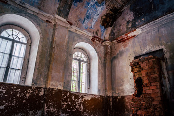 Fototapeta na wymiar Inside Interior of an old Abandoned Church in Latvia, Galgauska - light Shining Through the Windows