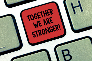 Writing note showing Together We Are Stronger. Business photo showcasing Working on a team gives best business results Keyboard Intention to create computer message keypad idea