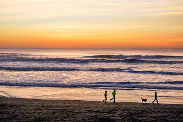 Runners At Sunset