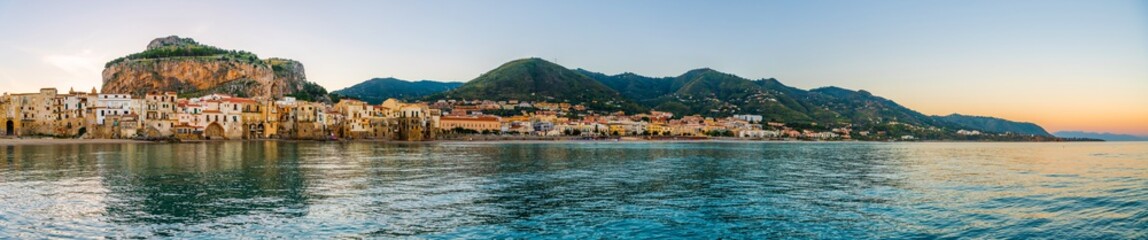 Fototapeta na wymiar Panoramic view over the italian coastal city Cefalu from the sea, nothern Sicily, Italy