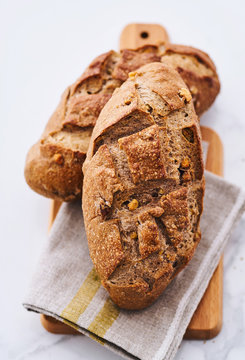 Close up of two loaves of rye bread sliced