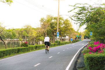 Riding bike in the park.