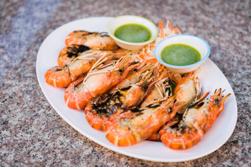 Thai BBQ Shrimps with seafood sauce.