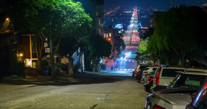 San Francisco Russian Hill Traffic Time-lapse. a time-lapse zooming down the reverse side of Lombard Street in San Francisco during night with traffic streaks