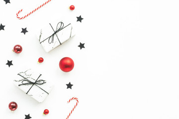 Christmas stars, decorations, gift on white background, flat lay, top view