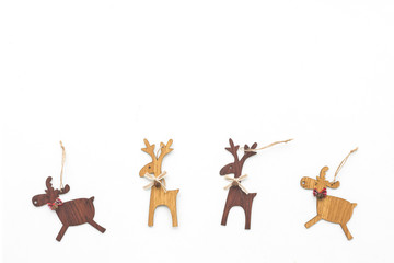 Wood christmas decoration on white background, top view, flat lay