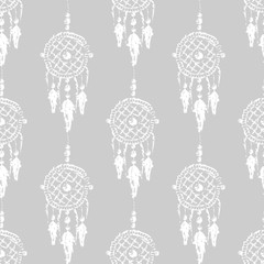 Grunge Dreamcatcher with feathers and branches. Native American Indian talisman. Boho design, tattoo art. Seamless pattern