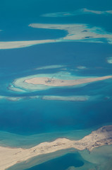 Obraz premium Aerial view of Hurghada seaside and islands in the Red sea. Airplane view background.