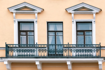 Three Windows with balcony.