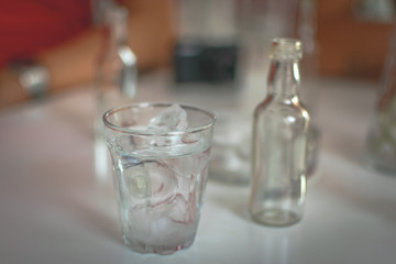 Glass of tsipouro on display in a bar