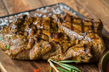 Grilled meat with sauce and spices.