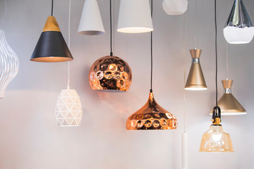Different modern streamlined mirror copper chandeliers. Bubble metal copper shade pendant - Powered by Adobe