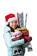 Photo of woman in Santa's cap with boxes with gifts with wrapping paper