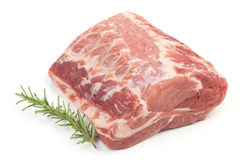 Raw pork neck boneless with rosemary, isolated on white background. Close-up
