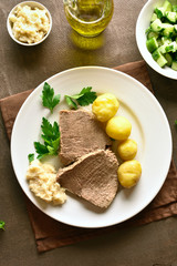 Boiled beef with potatoes and horseradish