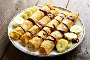 Crepes roll with banana slices