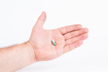 helping hand - holding a pill