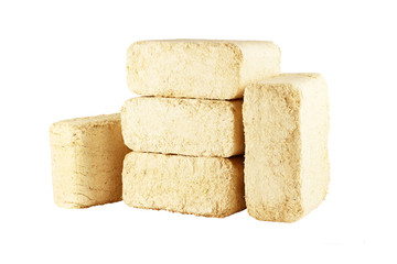 Wooden briquettes isolated on white background