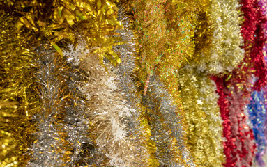 Soft and Silky Multi color Christmas Tinsel Garland Background