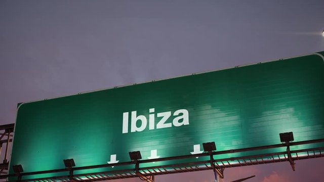 Airplane Landing Ibiza during a wonderful sunrise