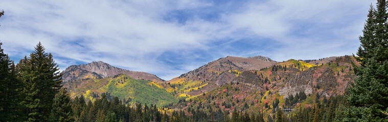 Fototapeta na wymiar Guardsman Pass views of Panoramic Landscape of the Pass from the Brighton side by Midway and Heber Valley along the Wasatch Front Rocky Mountains, Fall Leaf Forests bright orange and yellow colors. Ut
