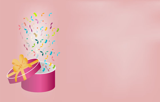 surprise pink gift box with a gold bow and ribbon with serpantine