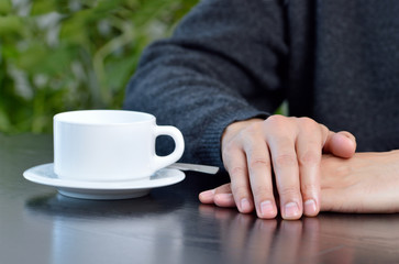 Man waiting at the coffee shop