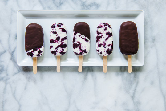 Blueberry Cheesecake Popsicles Dipped In Dark Chocolate