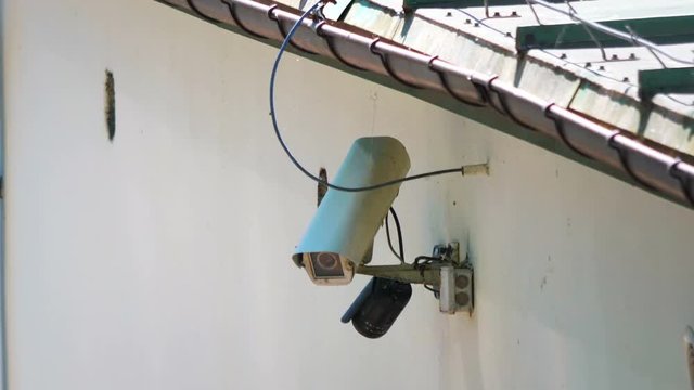 Security camera on the wall in 4K slow motion 60fps